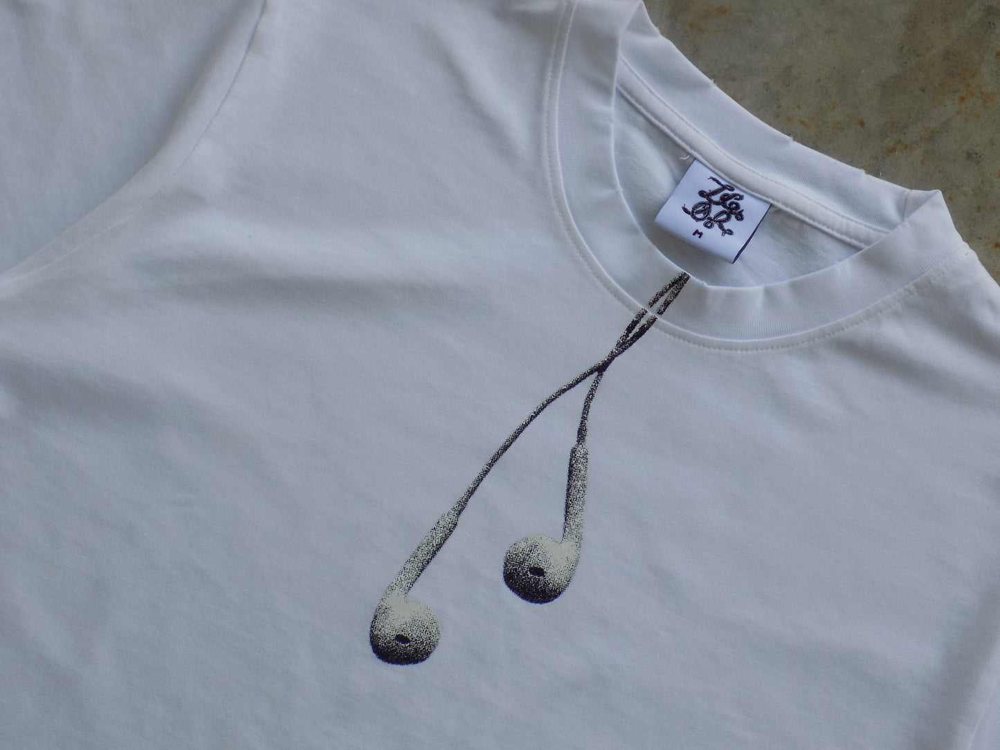 "MUSIC CONNECTS US" TEE