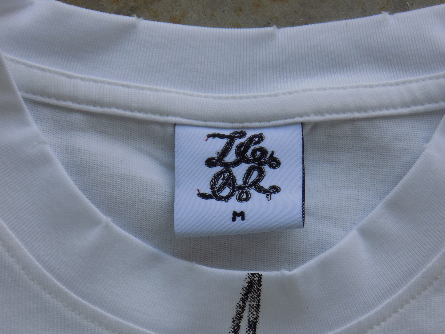 "MUSIC CONNECTS US" TEE